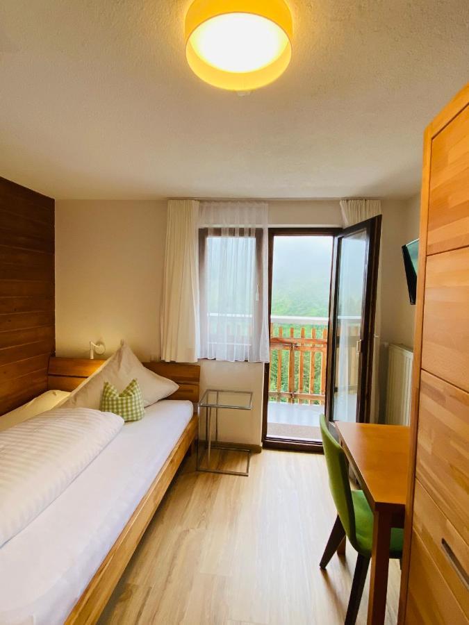 Hotel Garni Enzian Дамульс Экстерьер фото